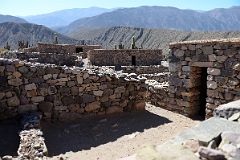 19 Restored Buildings Near Archaeologists Monument At Pucara de Tilcara In Quebrada De Humahuaca.jpg